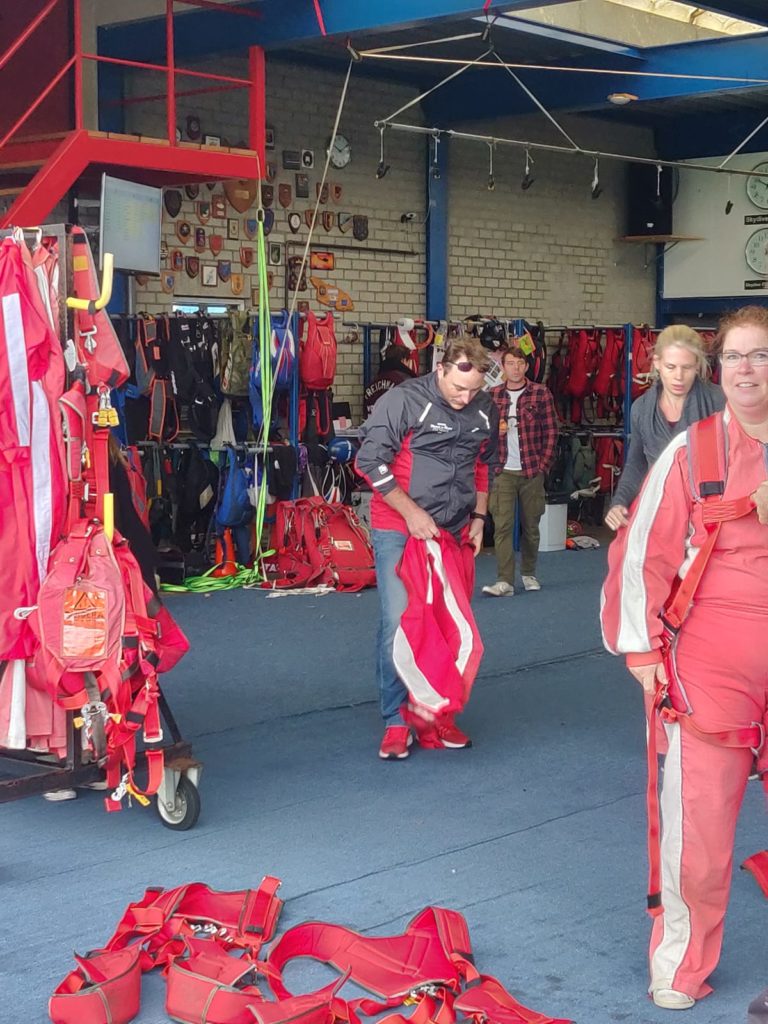 Prepare for Tandem parachute jump